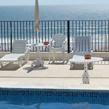 Qiu * Кошта-да-Капарика